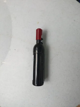 Bolígrafo saca corchos agenda pequeña.