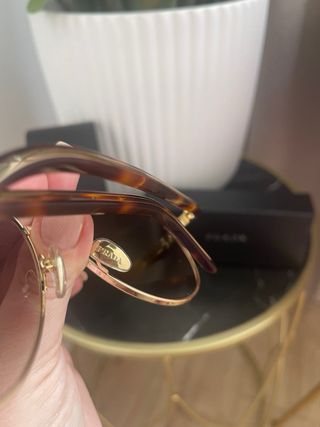 Gafas de sol Prada aviador doradas