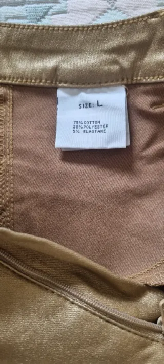 Pantalón pitillo elástico dorado