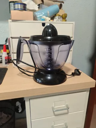 Exprimidor eléctrico de cítricos