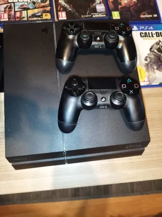 PS4 + 2 Mandos + Cascos + 8 Juegos