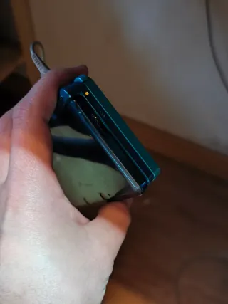 Nintendo 3DS con cargador y lapiz