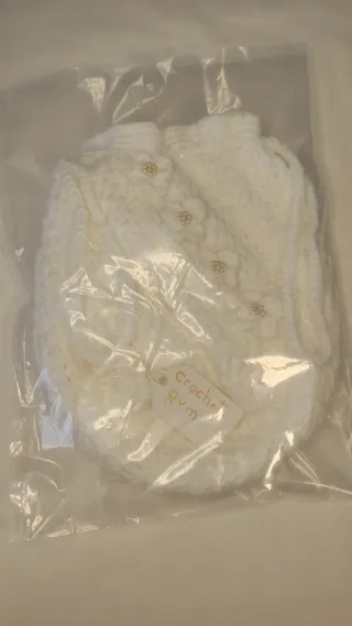 Bolso de mano blanco tejido con flores