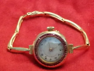 Pulsera Reloj Oro y Rubíes