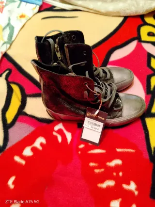 Botines de piel Destino negros y plateados