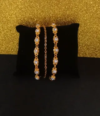 Pulsera dorada tres en una