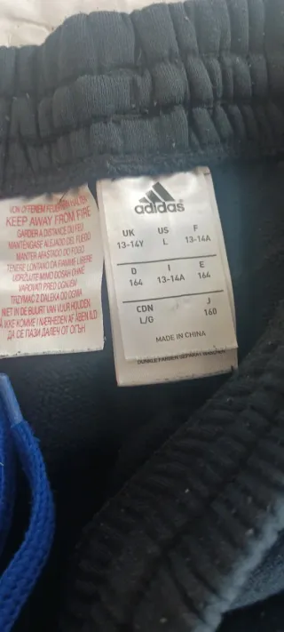 Chándal Adidas  original Negro  Azul y turquesa.