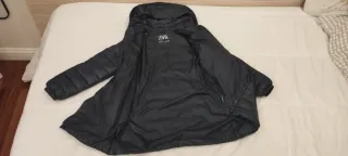 Plumífero niña azul marino con capucha Talla 10