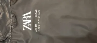 Plumífero niña azul marino con capucha Talla 10