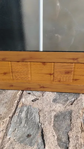 Puerta corredera doble y marco aluminio roble