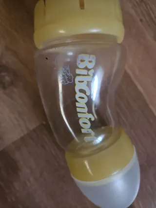 Lote 2 biberones + taza bebé