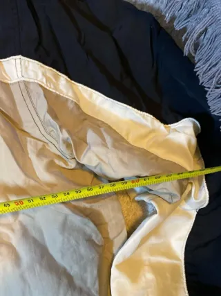 Chaqueta Trespass impermeable beige y negra