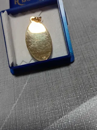 Medalla oro inicial M MORAN