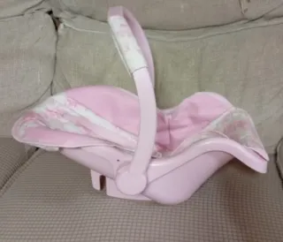 Maxi-Cosi de juguete rosa