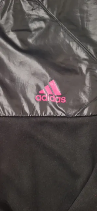 Giacca Adidas nera con zip rosa