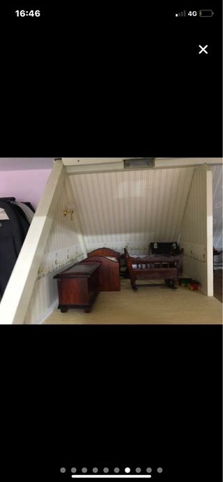 Casa de muñecas de madera