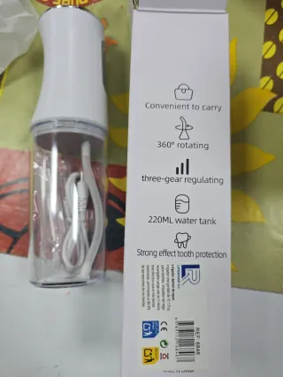 IRRIGADOR BUCAL Práctico enjuague dental eléctrico