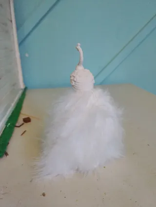 Miniatura de pavo real blanco