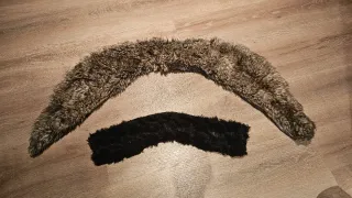 Cuello de piel marrones y otro negro