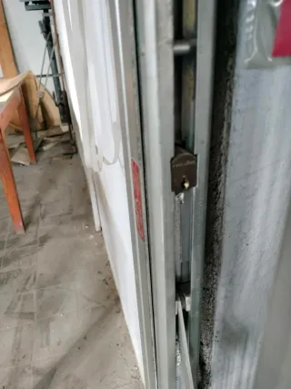 Reja seguridad extensible (ballesta) acero galvan.