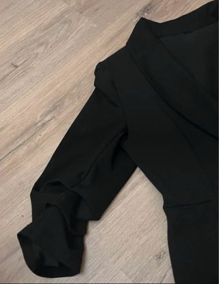 Mono blazer elegante negro