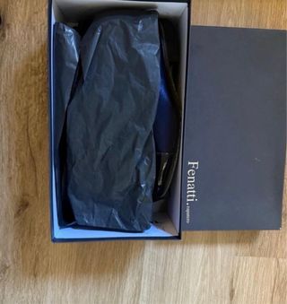 Zapatos de vestir negros y azules