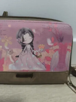 Cartera amplia con compartimentos