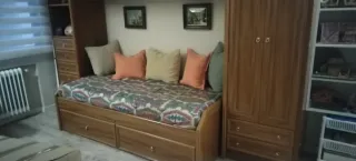 Dormitorio completo con cama nido