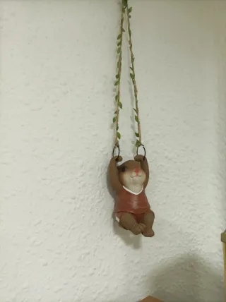 Figura de conejo en columpio decorativo