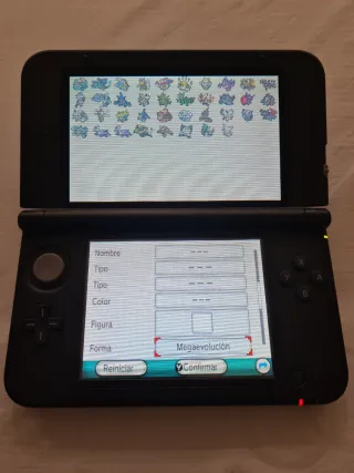 Nintendo 3DS XL + Pokémon Rubino Omega + Caricatore