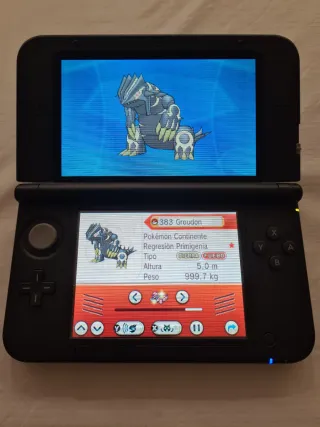 Nintendo 3DS XL + Pokémon Rubino Omega + Caricatore