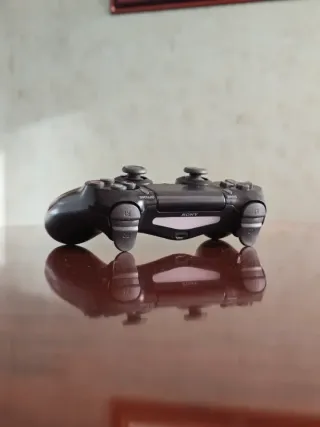 PlayStation 4 con mando dualsense PS4 y cascos