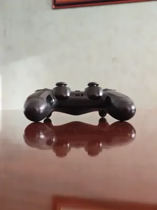 PlayStation 4 con mando dualsense PS4 y cascos