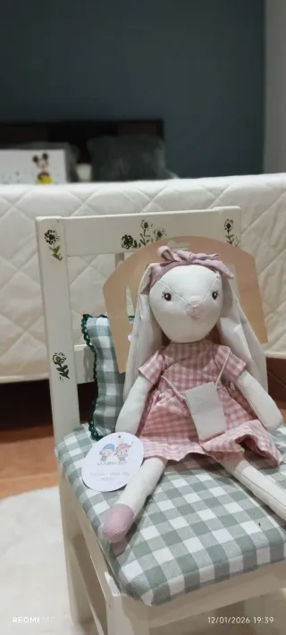 Muñeca de trapo con vestido rosa