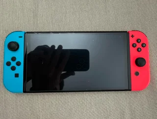 Nintendo Switch OLED + Accessori + Giochi_NUOVO
