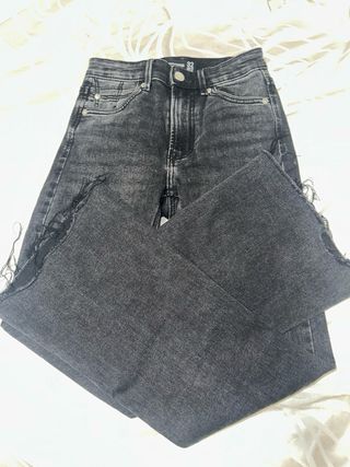 Vaqueros campana negros desgastados