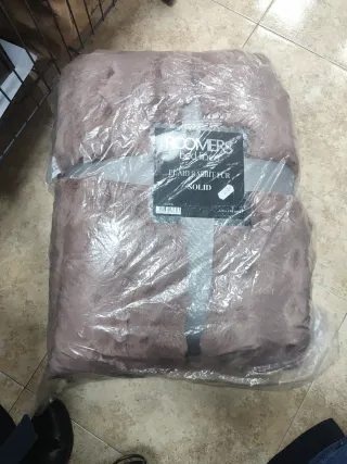 Manta de pelo con borrego nueva