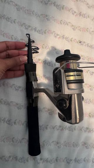 2 Caña de pescar con carrete