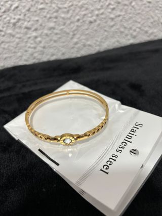 Pulsera dorada con circonita y eslabones