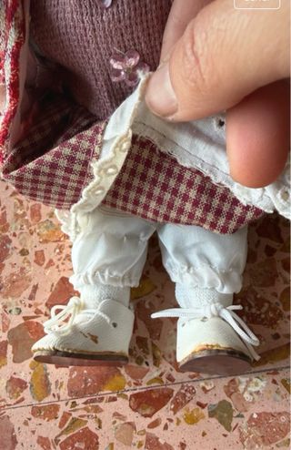 Muñeca de imitación porcelana con vestido