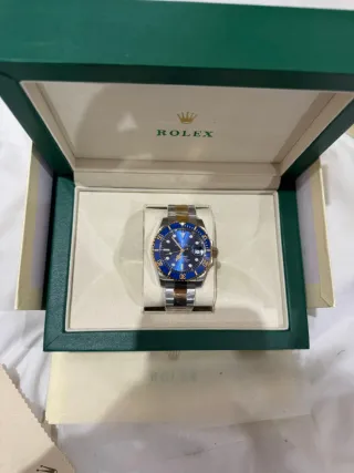 Reloj Rolex Azul y Dorado