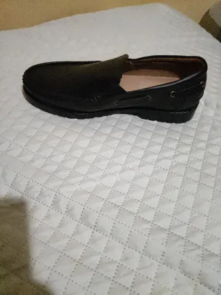 Mocasines de piel hombre negros, estilo clásico.