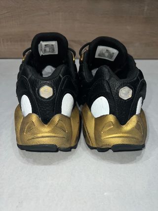 Nike Nocta Zapatillas Negras y Doradas