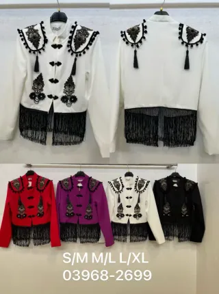 Chaqueta flamenca bordada con flecos