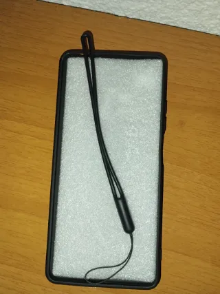 Funda móvil y cordón