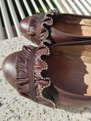 Zapatos planos de cuero marrón