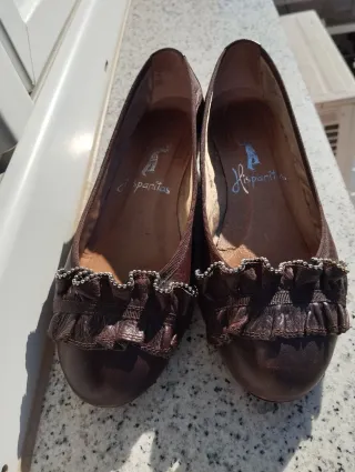 Zapatos planos de cuero marrón