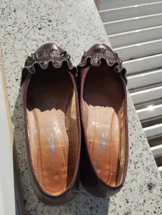 Zapatos planos de cuero marrón