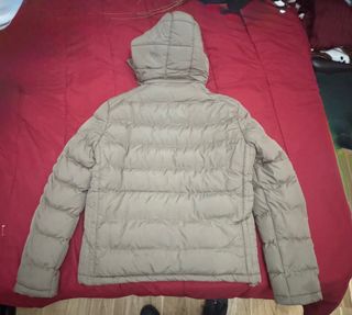 Chaqueta Nike acolchada beige