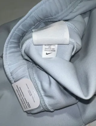 Pantalón Nike Tech Gris/Rosa